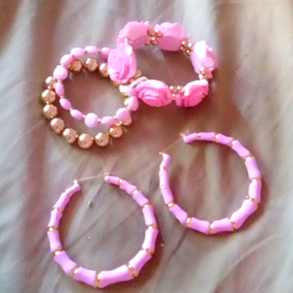 Light pink w/ gold trim hoop earrings..either matching bracelets
